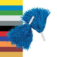 a blue duster on top of a multi colored striped background with a white handle