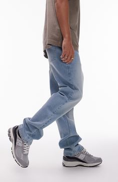 A faded-blue wash brings a fresh, laid-back look to classic straight-leg jeans made from nonstretch denim. 15" leg opening; 10 1/2" front rise; 14 1/2" back rise Zip fly with button closure Five-pocket style 100% cotton Machine wash, line dry Made in Turkey Washed Blue Straight Jeans, Urban Light Wash Jeans With Five Pockets, Straight Washed Blue Rigid Denim Jeans, Light Indigo Straight Leg Rigid Denim Jeans, Light Indigo Straight Leg Jeans In Rigid Denim, Urban Straight Leg Washed Jeans, Urban Faded Mid-rise Jeans, Casual Washed Blue Straight Bottoms, Washed Blue Relaxed Fit Straight Jeans