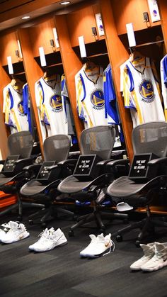 the locker room is filled with jerseys and shoes for basketball players to wear on their team