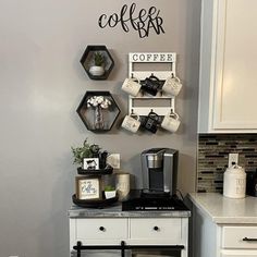 the coffee bar is decorated with black and white decor