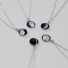 IMPORTANT NOTE: For Expected Delivery for Father's Day please order by June 9th. I recommend ordering with Priority Mail (usually 2-3 business days but can be longer). However I can only guarantee Priority Express Mail shipping will arrive in time. A custom moon phase necklace that glows in the dark. ◆ Quick Turnaround 2-5 days! ◆ Fast Shipping! ◆ Jewelry comes in a luxurious jewelry box! HOW TO ORDER Simply type your date in the personalization box. For optional Back Engraving please let me kno Moon Shaped White Necklace For Gift, White Moon Shaped Necklace For Gift, White Moon-shaped Necklace For Gift, White Sun And Moon Design Jewelry Gift, White Sun And Moon Design Jewelry For Gift, White Jewelry With Sun And Moon Design Gift, Personalized Moon-shaped Jewelry Gift, Moon Print Moon Shaped Necklace Gift, Moon Print Moon Shaped Necklace For Gift