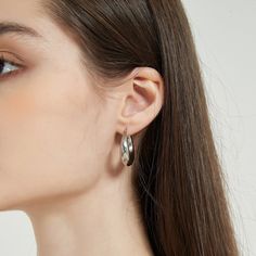 Minimal and classic silver hoop earrings. Your go to every-day earrings that adds a chic and vintage look to your outfit. The earrings are made from 316L surgical level stainless steel. A perfect addition to your jewelry collection! ………………………………….D E T A I L S• Materials: Stainless steel• Inner Diameter: 15mm• Outter Diameter: 25mm• This product is hypoallergenic, water and tarnish resistant Silver Tarnish Resistant Huggie Earrings, Chic Polished Silver Hoop Earrings, Chic Silver Hoop Earrings With Polished Finish, Classic Metal Huggie Earrings, Everyday Metal Earrings With Shiny Finish, Trendy Sterling Silver Hoop Earrings, Polished Finish Hoop Earrings, Chic Nickel-free Sterling Silver Hoop Earrings, Chic Silver Hoop Earrings Tarnish Resistant