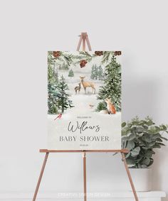 an easel with a baby shower sign on it