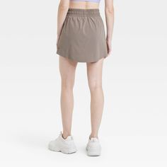 Why we're ALL IN: Woven mid-rise skort with built-in shorts in a regular-fit silhouette makes a cool choice for your active days. Moisture-wicking, quick-dry lightweight fabric helps you stay cool, while a drawcord elastic waistband provides a snug fit. Side pocket provides hands-free convenience and the UPF 50+ rating offers sun protection. All in Motion™: Made for every move, priced for every day. Casual Training Shorts With 5-inch Inseam, Casual Activewear With Built-in Shorts Above Knee, Casual Training Skort With Built-in Shorts, Casual Running Skort, Casual Sports Skort In Short Length, Casual 4-way Stretch Skort For Running, Casual Stretch Skort For Running, Casual Running Skort With 4-way Stretch, Casual Sport Skort With Built-in Shorts