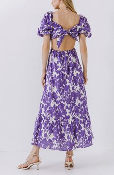 As if the pretty purple garden weren't giving you enough vacation vibes, this ankle-skimming dress sweetly seals the suitcase deal with its sassy open back. Ties behind back Sweetheart neck Short sleeves with elastic cuffs Lined 100% cotton Hand wash, dry flat Imported Women's Clothing Purple Brunch Dress With Smocked Back, Purple Dress With Smocked Back For Brunch, Summer Purple Cotton Maxi Dress, Summer Cotton Purple Maxi Dress, Spring Purple Midi Cotton Dress, Purple Cotton Maxi Dress For Summer, Spring Purple Cotton Midi Dress, Purple Cotton Midi Dress For Spring, Summer Purple Cotton Midi Dress