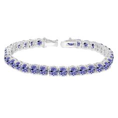 Wear this stylish bracelet to enhance your daytime and evening attire. This attractive tennis bracelet displays 5mm round cut gemstones in a polished prong setting that is perfect for evening wear and statement pieces. The bracelet is crafted of fine sterling silver and is nickel & tarnish free. It measures 7.25 inches and secures by box and tongue plus a safety latch. This gem bracelet in fine jewelry is a great addition to your tennis bracelets and gemstone jewelry collections. Product Det Formal Adjustable Bracelets With Gemstone Accents, Adjustable Formal Bracelets With Gemstone Accents, Formal Birthstone Bracelets, Adjustable Gemstone Accents Bracelets For Formal Occasions, Formal Oval Bracelets With Birthstone, Bracelet Displays, Gems Bracelet, Bow Bracelet, Bracelet Display