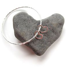 2 Hearts Sterling Silver Bangle Valentines by HanaMauiCreations, $40.00 Sterling Silver Bangle With Heart Charm, Sterling Silver Heart Bracelet For Mother's Day Anniversary, Sterling Silver Heart Bracelet For Anniversary And Mother's Day, Sterling Silver Heart Bracelet For Anniversary On Mother's Day, Silver Heart Bracelets For Anniversary Gift, Silver Heart Bracelet For Anniversary Gift, Silver Heart Bracelets For Anniversary, Silver Heart Bracelet For Mother's Day Promise, Sterling Silver Double Heart Bracelets