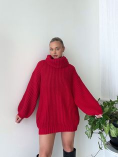 Details: Turtleneck sweater dress Chunky knit Oversized Ribbed Wide sleeves Size + Fit: Model is 5'4 Wearing size small Fabric + Care: 100% polyester Red Turtleneck Outfit, Dress With Thigh High Boots, Dresses With Thigh High Boots, Flame Sweater, Turtleneck Outfit, Red Sweater Dress, Red Turtleneck, Womens Sweaters, Crochet Clothing