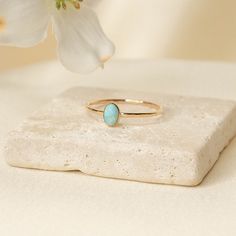 Turquoise Stone has often been associated with protection, luck, and abundance. In many cultures , it is believed that wearing turquoise can ward off negative energies and bring good fortune. Details: 14K Gold Filled + Sterling Silver 6x4mm Turquoise 1.3MM Textured Ring Since every piece is handmade, you may experience a slight color difference in places where the metal has been soldered making every piece truly unique. Purchase three or more rings and save 20% with discount code 'STACK20' Oval Turquoise Ring With Polished Finish, Oval Gold Turquoise Ring In Sterling Silver, Gold Oval Turquoise Sterling Silver Ring, White Oval Turquoise Ring In Sterling Silver, Handmade Oval Turquoise Ring - Spiritual Style, Textured Ring, Oval Ring, Oval Rings, Custom Initials