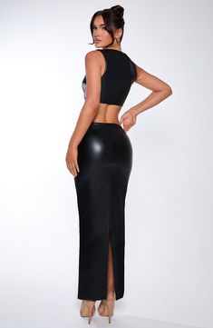 Amp up the drama in Odetta, a sleek, sexy maxi cut from soft faux leather with a mid rise fit, pencil shaped skirt and split to the centre back. Style her up with the Amaya crop or a bodysuit. 



Colour: Black.

Premium faux leather with slight stretch.

Fully lined.

Mid rise.

Pencil shaped skirt.

Split to centre back.

Invisible zip fastening.

Maxi length.

Model is an XS and is wearing an XS.

 Size: XS, S, M, L, XL, XXL Split Long Dress, Loungewear Dresses, Maxi Dress Sale, Maxi Dress Navy, Invisible Zip, The Drama, Formal Party, Dress Pant, Black Maxi Dress