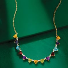 Ross-Simons - 13.50ct t. w. Heart-Shaped Multi-Gemstone Necklace Over Sterling. 18". Our vibrant necklace brings beauty to any ensemble. 13.50 ct. tot. gem wt. heart-shaped citrine, iolite, Swiss blue topaz, garnet, amethyst and peridot gems brightly glow, with white topaz rounds sparkling in between. Finely crafted in polished 18kt yellow gold over sterling silver and stationed on a rolo chain with a 2" extender. Lobster clasp, heart-shaped multi-gemstone necklace. Garnet birthstones are the pe Elegant Multicolor Heart Cut Jewelry, Multicolor Gemstone Necklace For Anniversary, Elegant Multicolor Valentine's Day Jewelry, Elegant Multicolor Heart Cut Necklace, Multicolor Gemstone Jewelry For Valentine's Day, Fine Multi-stone Jewelry For Valentine's Day, Heart-shaped Multi-stone Necklace Gift, Fine Jewelry Multi-stone For Valentine's Day, Elegant Heart-shaped Multi-stone Necklace