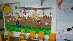 the children's room has been decorated with cartoon characters and colorful decorations on the wall