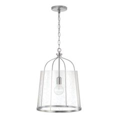 a light fixture with a glass shade hanging from it's center point, and a metal chain attached to the ceiling