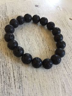 "Lava Rock beaded bracelet, 8mm beads, elastic Average bracelet size for women in 7\" and for men 8\" printable ruler - https://printable-ruler.net/ Add 1/4 inch to 1 inch (average is 1/2 inch) to your wrist size, depending on whether you would like a snug, comfort, or loose fit. Unisex Jewelry LAVA ROCK BEADS Since lava is known for its grounding qualities, it's wonderful for calming the emotions. In fact, the quality of fire springs from the ground, so in terms of healing gems, this lends itse Printable Ruler, 8mm Beads, Lava Beads, Lava Rock, Unisex Bracelets, Lava Bead, Geek Gifts, Unisex Jewelry, Agate Beads