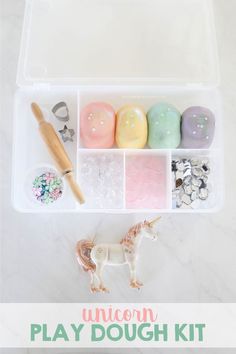 the unicorn play dough kit is organized in a plastic container