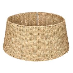 a large round basket that is made out of straw