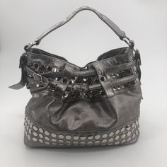 Rebecca Minkoff Devote Tote Hobo Handbag Bucket Bag Metallic Silver Studded Heavy Approximate Measurements: 14" W X 11" T 6.25: Handle Drop Good Pre-Owned Condition. Stain On Lining (See 8th Photo). Some Light Scratches From Wear On Studs. No Rips Or Holes. Please See Photos For Condition Details. From A Smoke-Free, Pet-Friendly Home. Designer Shoulder Bag With Metal Hardware For Daily Use, Designer Shoulder Bag For Daily Use With Metal Hardware, Designer Satchel Shoulder Bag For Errands, Designer Bucket Hobo Bag For Shopping, Designer Bags With Metal Hardware For Daily Use, Designer Rectangular Hobo Bag For Errands, Luxury Hobo Bag With Adjustable Strap, Evening Satchel With Gunmetal Hardware, Designer Bucket Hobo Bag