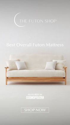 a white couch with pillows on it and the words best overall futon mattress shop now