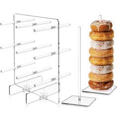 a stack of doughnuts sitting on top of each other in front of a white background