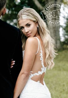 a beautiful blonde woman in a wedding dress