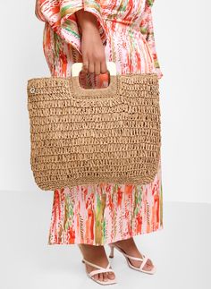 Woven DetailMeasures: 17.5" x 15"Exterior- 100% StrawInterior Lining- 30% Cotton, 70% PolyesterNatural Wood HandlesTop Zipper Closure Exterior Side SnapsInside Small Open Sidewall Pocket Straw Tote, Straw, Exterior, Zipper, Wood