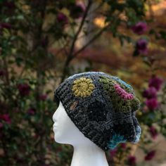 "Size Adult Medium: 21\"/53 cm to 23\"/58 cm head circumference: Created with 100% wool, this granny square hat is perfect for the fall climate. The lightweight wool yarn and black poly satin lining help keep hair protected from cold, dry air and the damaging effects of friction. The stretchy brim is lined and can comfortably fit most adults. Care: For best results hand wash, gently squeeze, reshape and lay flat to dry. IMPORTANT INFORMATION: We include tracking updates with every purchase. Plea Square Hat, Granny Square Hat, Patchwork Crochet, Pocket Scarves, Dry Air, Frizz Free Hair, Handcrafted Accessories, Frizz Free, Pink Coral