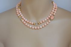 "This is a 14K Long Pink Coral Necklace (36 \"), Lovely pink 8.5mm coral beads with gold balls and crystal intermittant spacing with an oval coral clasp (16 X 11.5 ) mm. Stock # BB76CRL27" Beads With Gold Balls, Luxury Coral Necklace With Gemstone Beads, Luxury Coral Gemstone Beads Necklace, Coral Necklace With Faceted Round Beads, Elegant Coral Hand-strung Necklaces, Elegant Coral Polished Beads, Crystal Beaded Necklace, Gold Claddagh Ring, Crystal Bead Necklace