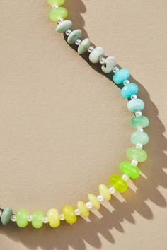 Rainbow Stone Necklace | Anthropologie Trendy Green Jewelry With Faceted Beads, Turquoise Glass Jewelry With Gemstone Beads, Turquoise Glass Beads Jewelry, Turquoise Beaded Glass Jewelry, Multicolor Jade Beaded Necklaces With Round Beads, Summer Hand-strung Green Jewelry, Multicolor Hand-strung Jade Jewelry, Green Glass Round Bead Jewelry, Green Faceted Glass Beads