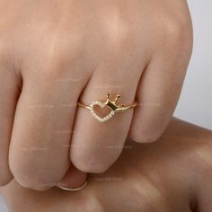 Description Solid 14K Yellow Gold Heart Crown Ring With Genuine 0.08 Ct. SI Clarity G H Color Diamond Love Heart Ring Minimalist Jewelry Gift For Her ≫ Features * Items Code:- SR01710 * Solid 14K Yellow Gold with stamped * 18K also available - Additional fees may apply) * More option in gold color:- Rose gold, yellow gold, White gold * Diamonds Wt.:- 0.08 Ct. * Diamond color:- G-H * Diamonds Clarity:- SI * Diamonds Cut:- Brilliant * Ring Size:- 3 to 10 (As per your request) ≫ FAQ below for more Gold Jewelry Fashion Ring, Pretty Jewellery Rings, Ladies Rings Gold Design, Crown Ring Design, Gold Finger Rings For Women, Gold Ring Ideas, New Ring Designs Gold, Rose Gold Crown Ring, Love Ring Gold