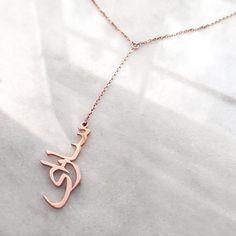 Our jewelry is always long lasting, beautiful, and of the highest quality. Our Persian (Farsi) and Arabic name necklaces are classic, unique pieces that are worth the investment. Personalize your necklace with this beautiful writing. We are happy to translate for you and we can't wait for you to fall in love with your very own piece.DETAILS- Crafted with pure sterling silver and optional gold-plating OR pure solid gold- Chain style may vary slightly- Made in New York*Note: Our 18k white and 18k Elegant Long Engraved Necklace, Elegant Customized Jewelry For Formal Occasions, Customized Elegant Jewelry For Formal Occasions, Spiritual Sterling Silver Lariat Necklace Gift, Elegant Custom Necklace With Polished Finish For Gift, Elegant Lariat Necklace With Round Pendant, Luxury Lariat Necklace With Pendant, Elegant Lariat Necklace With Round Pendant As Gift, Spiritual Polished Wedding Necklaces