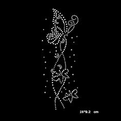 a black background with white dots and flowers