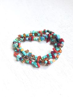 Wrap Handmade colorful Beads Bracelet, Bracelet for teenagers, Bobo Hippie Bracelet, Gifts for her, One of a kind Bracelet. Eclectic bracelet handmade with colorful gemstone, turquoise, red coral, copper findings and glass beads. light and comfortable to wear, avoid water and perfume. Wraps 3 times around 6 to 7 inches wrist. Free shipping with USPS mail, packed and protected in a gift box. Multicolor Friendship Bracelets With Spacer Beads As Gift, Wrap Bracelet Bangle With Spacer Beads As Gift, Hippie Turquoise Hand-strung Bracelets, Hand-strung Multicolor Bracelets For Friendship, Turquoise Multi-strand Wrap Bracelet As Gift, Turquoise Hand-wrapped Hippie Beaded Bracelets, Multicolor Beaded Wrap Bracelet As Gift, Multicolor Beaded Friendship Wrap Bracelet, Gift Wrap Bracelet Bangle With Spacer Beads