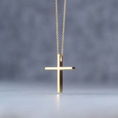 Minimal solid gold handmade cross necklace, unisex cross, great for men and women alike. Available in 14k yellow and 14k white gold, please make your choice from the drop down menu. This pendant has a shiny/polished finish. Size: 1,9 cm / 0.8 inches long and 1.5cm / 0,6 inches wide Material: 14k solid yellow gold, 14k solid white gold You can choose the charm with a 14k solid gold chain or without a chain. Perfect Birthday gift, Baptism gift or for any other special occasion. Comes in gift box. Minimalist 14k Gold Cross Pendant Necklace, Gold Minimalist Tarnish Resistant Cross Necklace, Minimalist Yellow Gold Cross Pendant Jewelry, Minimalist Cross Necklace Tarnish Resistant, Minimalist Everyday Cross Necklace, Minimalist Daily Wear Cross Pendant Necklace, Minimalist Cross Pendant Jewelry Gift, Everyday Minimalist Cross Pendant Necklace, Simple Yellow Gold Cross Necklace