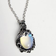 Dare to be bold with this Retro Moonstone Necklace! This statement piece glimmers with daring style, and will be sure to turn heads. Add a touch of glamour to your look and stand out from the crowd! 🤩 🌕 Mystical Silver Necklace For Party, Moon-shaped Clavicle Chain Necklace For Party, Moon Charm Pendant Necklaces For Party, Moon Charm Pendant Necklace For Party, Party Pendant Necklace With Moon Charm, Party Moon Charm Pendant Jewelry, Moon Charm Pendant Jewelry For Party, Party Pendant Jewelry With Moon Charm, Moon Charm Party Necklace