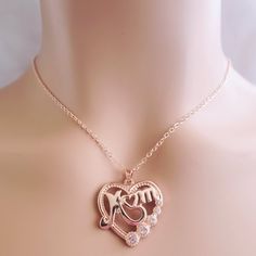 Beautiful Mom Rosegold Necklace Condition: New Material: Rosegold Length: 19in With 2.5in Extender Rose Gold Clavicle Chain Necklace For Mother's Day, Mother's Day Rose Gold Clavicle Chain Necklace, Rose Gold Metal Heart Pendant Jewelry, Valentine's Day Rose Gold Metal Jewelry, Elegant Rose Gold Charm Necklaces For Mother's Day, Rose Gold Charm Necklace For Valentine's Day Party, Rose Gold Metal Necklaces For Anniversary, Rose Gold Metal Necklace For Anniversary, Anniversary Rose Gold Metal Necklace