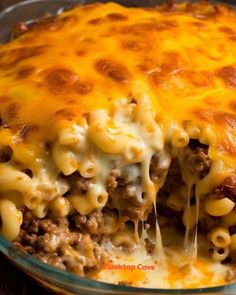 a casserole dish filled with meat and cheese