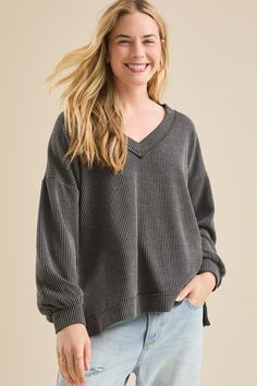 Diya Urban Ribbed Tunic in Charcoal | Altar'd State Ribbed Long Sleeve V-neck Sweater For Loungewear, Oversized V-neck Sweater For Loungewear, Ribbed V-neck Sweater For Layering, Oversized V-neck Tops With Ribbed Cuffs, Cozy Ribbed V-neck Long Sleeve Sweater, Gray V-neck Sweater For Loungewear, Long Sleeve V-neck Sweater With Ribbed Cuffs For Loungewear, V-neck Sweater For Loungewear In Fall, Oversized Comfortable V-neck Top