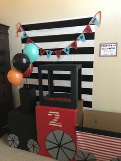 a train themed birthday party with balloons and decorations