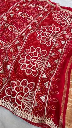 FABRIC OF SAREE Pure Gajji silk bandhani  Fabric of blouse pure gajji silk COLOUR - Red        WORK Gotapatti         .  Note - Prebooking 15 days approximately Art Silk Blouse Piece With Bandhani Print, Art Silk Saree Blouse Piece With Bandhani Print, Navratri Chanderi Blouse Piece With Bandhani Print, Festival Bandhani Print Blouse Piece, Bollywood Style Bandhani Print Blouse Piece For Festive Occasions, Festive Bandhani Print Saree Blouse Piece, Festive Navratri Blouse Piece With Bandhani Print, Bandhani Print Saree For Navratri, Navratri Bandhani Print Saree