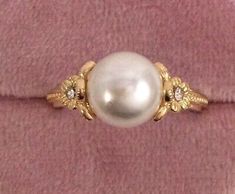 https://jewelrysalehub.com The beautiful Pearl is 8.5 mm wide. note: the inner band of the ring is silver. (this is a small ring size). ring size L. A stunning Ring,in excellent condition. Rings Engagement Pearl, Simple Pearl Engagement Ring, Engagement Rings Pearls, Wedding Ring Beautiful, Engagement Rings With Multiple Diamonds, Dream Engagement Rings Dream Engagement Rings Unique, Artisan Engagement Rings, 1800s Ring, Gold Ring Vintage