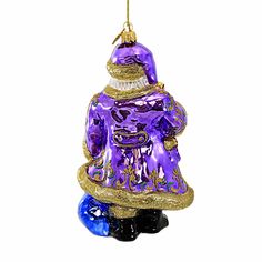 a purple glass ornament hanging on a string