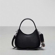 Coachtopia Ergo Mini Bag Originally $195 No Dust Bag Bought And Used Twice No Flaws Length : 6.5” Height : 4.0” Width :2.5” Long Strap : 21.5” Leather Material Coachtopia Ergo, Bags Coach, Coach Purse, Coach Purses, Leather Material, Mini Bag, Shoulder Bags, Dust Bag, Bag Lady