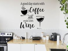 a kitchen wall with coffee and wine decals on it