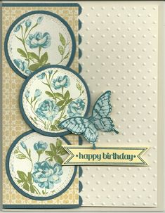 a birthday card with blue flowers and a butterfly