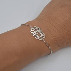 "Silver Monogram bracelet-Sterling silver monogram jewelry-Handmade Christmas gift for Sister This Personalized Monogram Bracelet is one of the most special and personal pieces of jewelry you can own or give as a gift. Please choose 1-3 letters you like and I will create your unique monogram.It can be your initials (usually with the family name in the center),or the initials of those most special to you. HOW TO ORDER: Step 1: Select color and Wrist Size. Step 2: Please write specify the \"initia Sterling Silver Name Bracelet Jewelry, Sterling Silver Initials Bracelet For Personalized Gift, Personalized Sterling Silver Initials Bracelet, Classic Sterling Silver Name Bracelet For Gifts, Classic Sterling Silver Name Bracelet As Gift, Engraved Sterling Silver Name Bracelet For Gift, Classic Initials Bracelet, Perfect As Gift, Personalized Silver Bracelets With Initials, Personalized Silver Bracelet With Initials