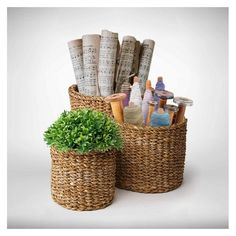 two wicker baskets filled with different types of pens and paperweights next to each other