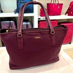 New With Tags Tumi Voyager Nylon And Leather Tote. 95% Nylon And 5% Cowhide Leather. Can Fit A 13” Laptop. Tumi Bags, Womens Tote Bags, Cowhide Leather, Color Purple, Leather Tote, Laptop, Tags, Purple, Leather