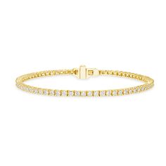 Elevate your everyday elegance with our Small Diamond Tennis Bracelet - a dainty masterpiece that transcends time. This solid 14 karat gold bracelet, set with your choice of lab-grown or natural diamonds, is a perfect blend of sophistication and sentimentality. Adorn your wrist with understated glamour, turning each day into a celebration of enduring style. Details: 14 Karat Gold (available in white, rose, or yellow gold) Gram Weight ~ 4.04 g (5.5"), 4.34 g (6.0"), 4.64 g (6.5"), 4.94 g (7.0") S Classic 14k Gold Diamond Bracelet With Vvs Clarity, Classic 14k Gold Diamond Cut Chain Bracelet, Classic Yellow Gold Diamond Bangle Bracelet, Timeless 14k Gold Diamond Bracelet With Vvs Clarity, Classic Yellow Gold Diamond Bracelet With Prong Setting, Classic 14k Gold Diamond Bracelet, Formal 14k Gold Bracelets With Vvs Clarity, Elegant Yellow Gold Diamond Bracelet With Flexibility, Elegant Yellow Gold Tennis Bracelet For Anniversary