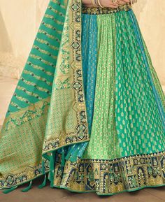 Fabric Details: Blouse: Banarasi Silk Blouse Color : Morpich Blouse Piece Length: 1-1.2 meters Lehenga: Banarasi Silk (Customise upto 42") Lehenga Type: Circular Lehenga Gher: 3.5+ meters Lehenga Length: Max 42 Inch Lehenga Color: Rama Pista Firozi Dupatta: Banarasi Silk Dupatta Length : 2.5 meters Dupatta Color: Rama Pista Multicolor Banarasi Silk Lehenga, Bohemian Multicolor Banarasi Silk Lehenga, Multicolor Banarasi Silk Meenakari Lehenga, Multicolor Embroidered Banarasi Silk Lehenga, Pista Green Semi-stitched Banarasi Silk Dupatta, Georgette Material, Black Lehenga, Grace To You, Net Dupatta