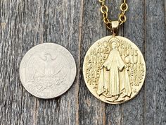 An absolutely stunning shiny gold antique replica Miraculous Medal from France...one of my favorite pieces! The medal with beautiful depth and detail hangs on a gold chain. This French Miraculous Medal is the piece everyone raves over and is my bestseller. This medal is available in antiqued sterling silver, bronze, shiny gold bronze and antique gold. This fine antique replica Miraculous Medal is cast in solid gold bronze using the lost wax method and produced in the U.S.A. Solid gold bronze doe Antique Finish Gold Necklace For Anniversary, Gold Necklaces With Antique Finish For Anniversary, Anniversary Gold Necklace With Antique Finish, Antique Finish Gold Jewelry For Commemoration, Gold Antique Finish Jewelry For Commemoration, Opening An Etsy Shop, Pray For Us, Miraculous Medal, Lost Wax